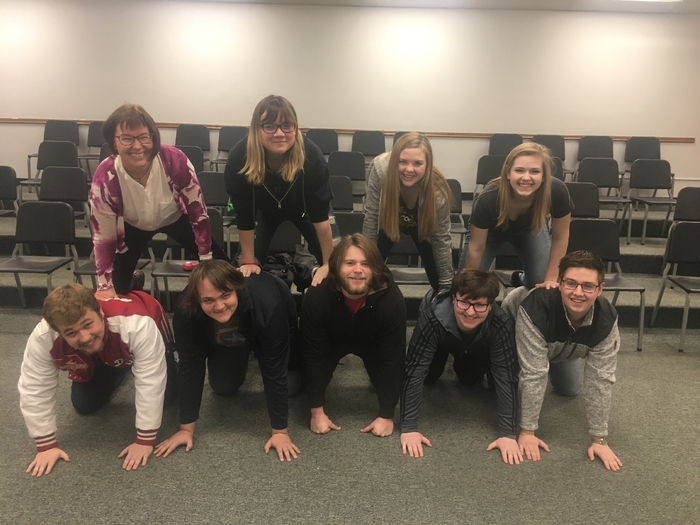 students forming a bridge