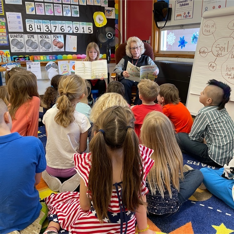 Mrs. Bradley reading to second graders